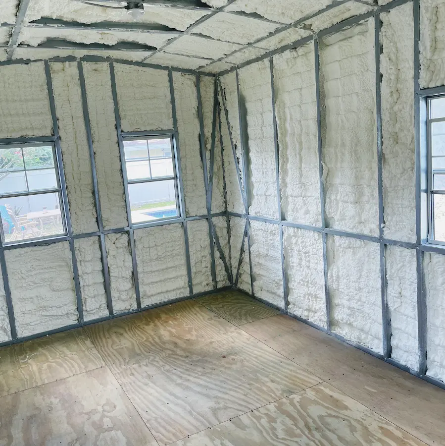 Closed-cell spray foam insulation applied to wall cavities in a residential project in North Fond du Lac